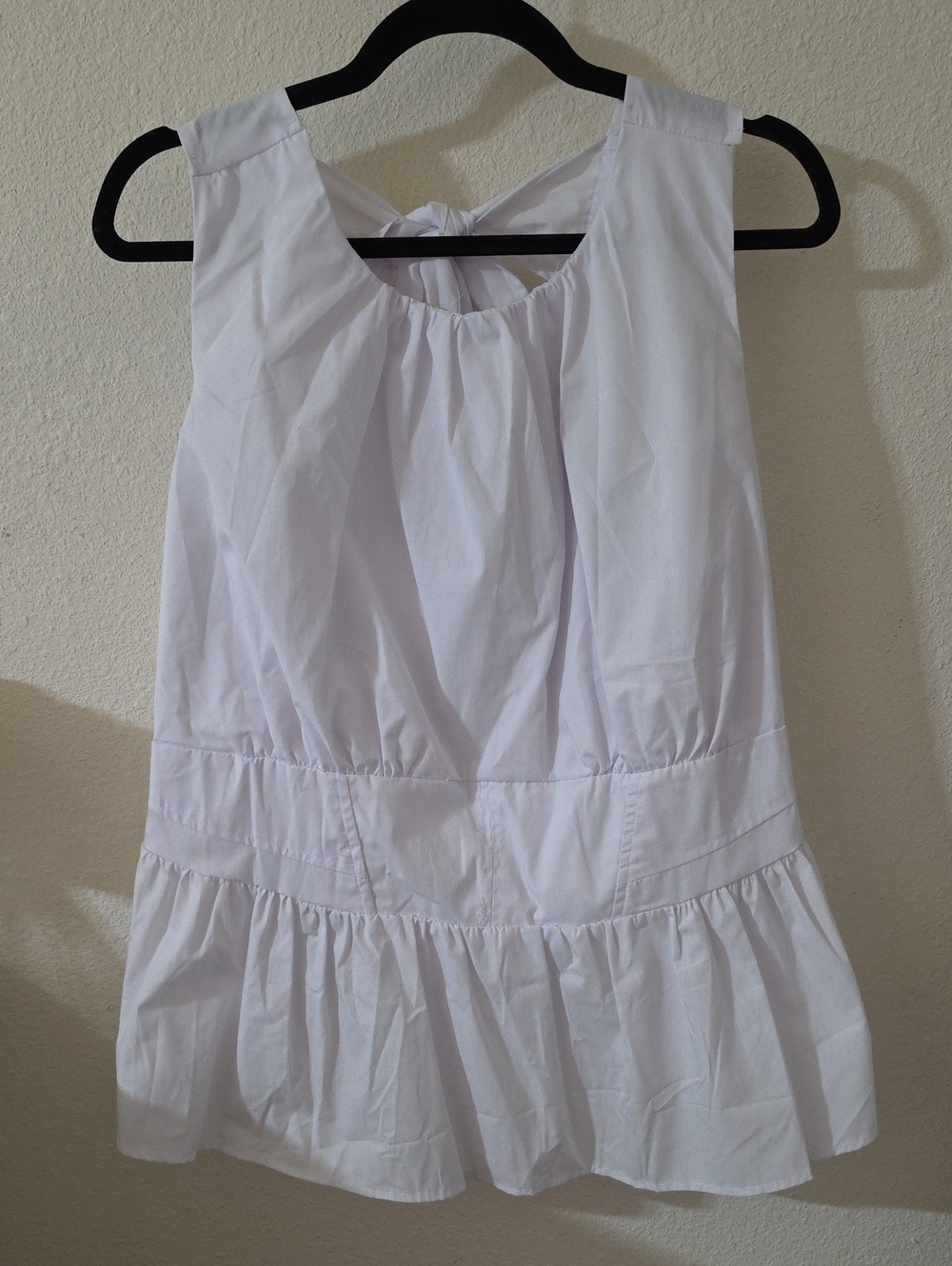 White Sleeveless Ruffle-Hem Women's Top
